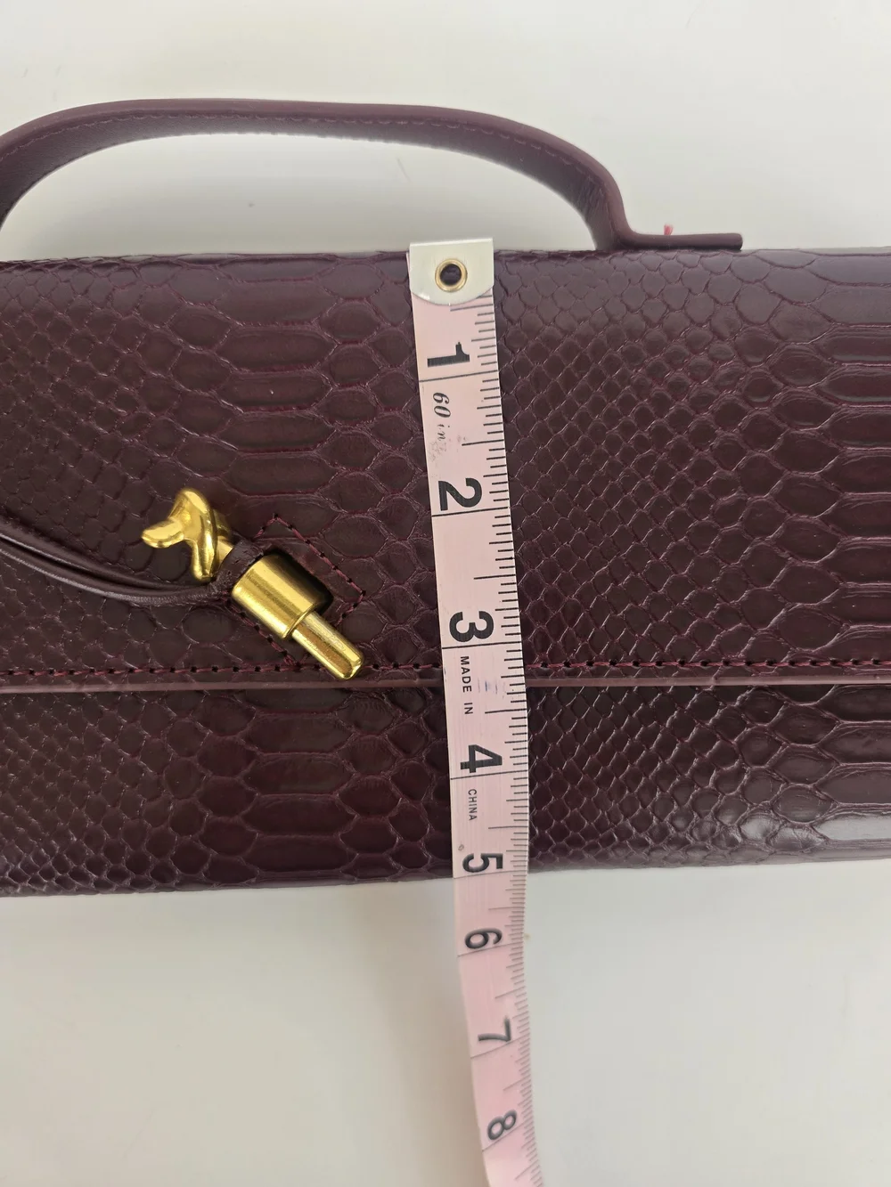 Elegant Burgundy Python-Embossed Top-Handle Bag